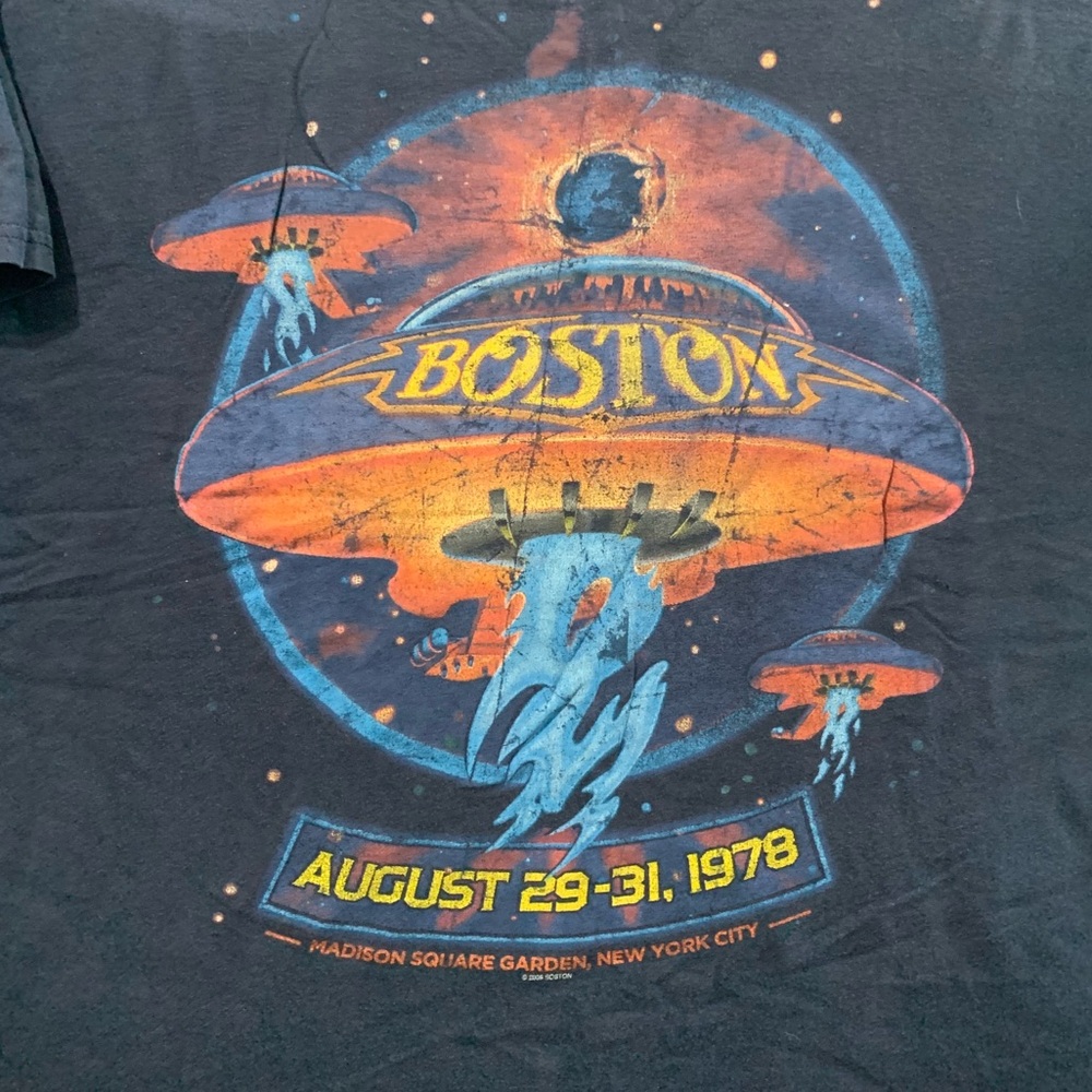 Rock Band “BOSTON” tour shirt. Fair condition small hole. XL